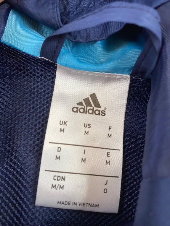 ADIDAS giacca antivento con logo blu da uomo M