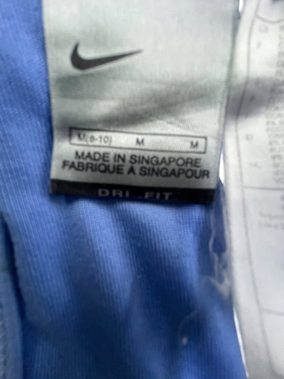 NIKE ΑΘΛΗΤΙΚΟ ΦΑΝΕΛΑΚΙ (TANK TOP) CROSS-BACK ΜΕ ΛΟΓΟΤΥΠΟ ΜΠΛΕ ΓΥΝΑΙΚΕΙΟ M