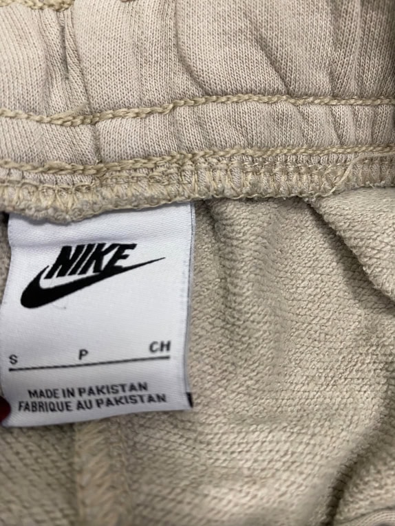 Pantaloni tuta vintage Nike con logo ricamato beige da donna S