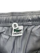 LACOSTE ΠΑΝΤΕΛΟΝΙ ΦΟΡΜΑΣ TRACK PANTS ΜΕ ΠΛΑΪΝΟ LOGO TAPE ΓΚΡΙ ΑΝΔΡΙΚΟ SMALL