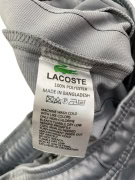 LACOSTE ΠΑΝΤΕΛΟΝΙ ΦΟΡΜΑΣ TRACK PANTS ΜΕ ΠΛΑΪΝΟ LOGO TAPE ΓΚΡΙ ΑΝΔΡΙΚΟ SMALL