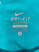 NIKE ΚΟΛΑΝ DRI-FIT ATHLETIC CAPRI ΜΕΛΑΝΖΕ ΤΙΡΚΟΥΑΖ ΓΥΝΑΙΚΕΙΟ S