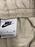 Pantaloni tuta vintage Nike con logo ricamato beige da donna S
